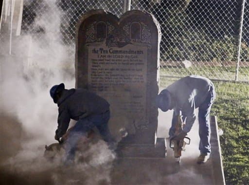 workers removing ten commandments from oklahoma capitol